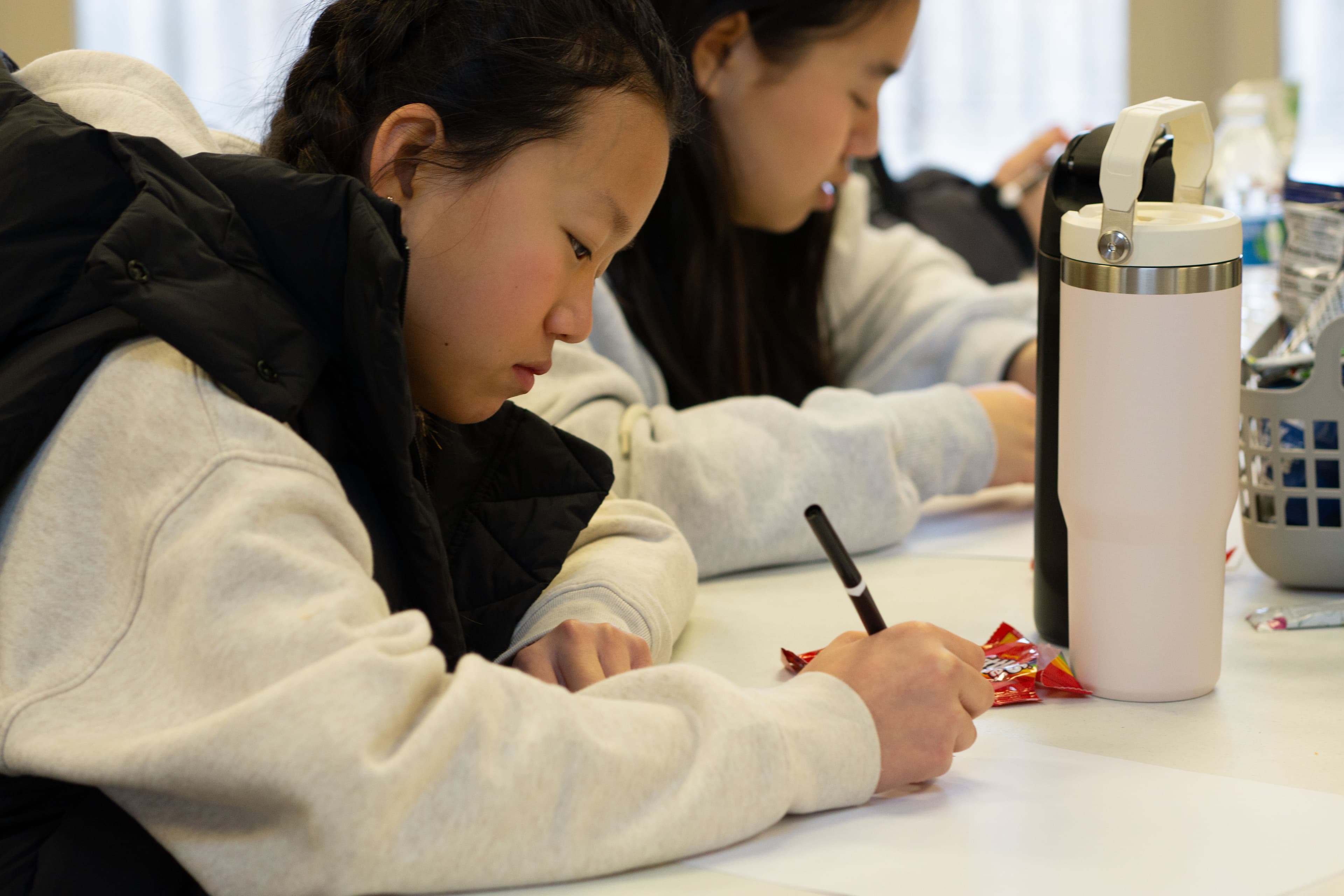 Metro Next youth group student taking notes